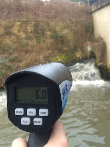 Hand held surface velocity radar gun in use